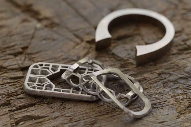 Progress of bespoke tablet ring in 18ct white gold with tablet face and band. Handmade by Sydney jeweller Nicky Burles.