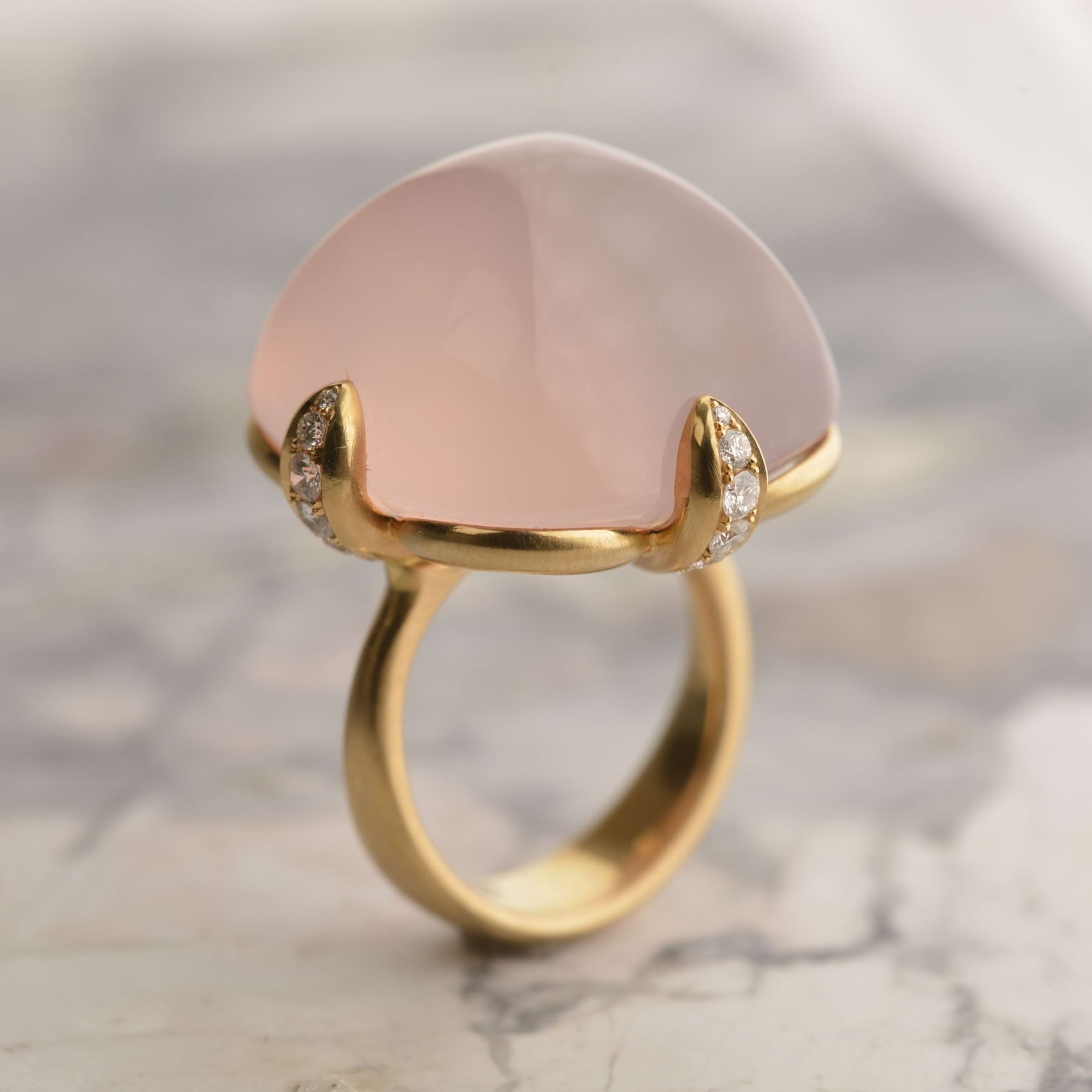 50 carat rose quartz ring set in 18-carat gold featuring pave-set claws adorned in natural diamonds. Handmade by Sydney jeweller Nicky Burles.