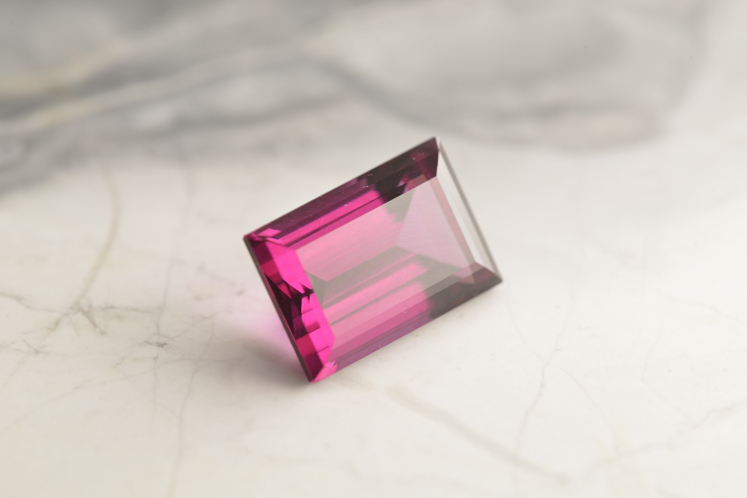 Bold 13.10ct Baguette Cut Rhodolite Garnet, richly saturated and beautifully cut.
