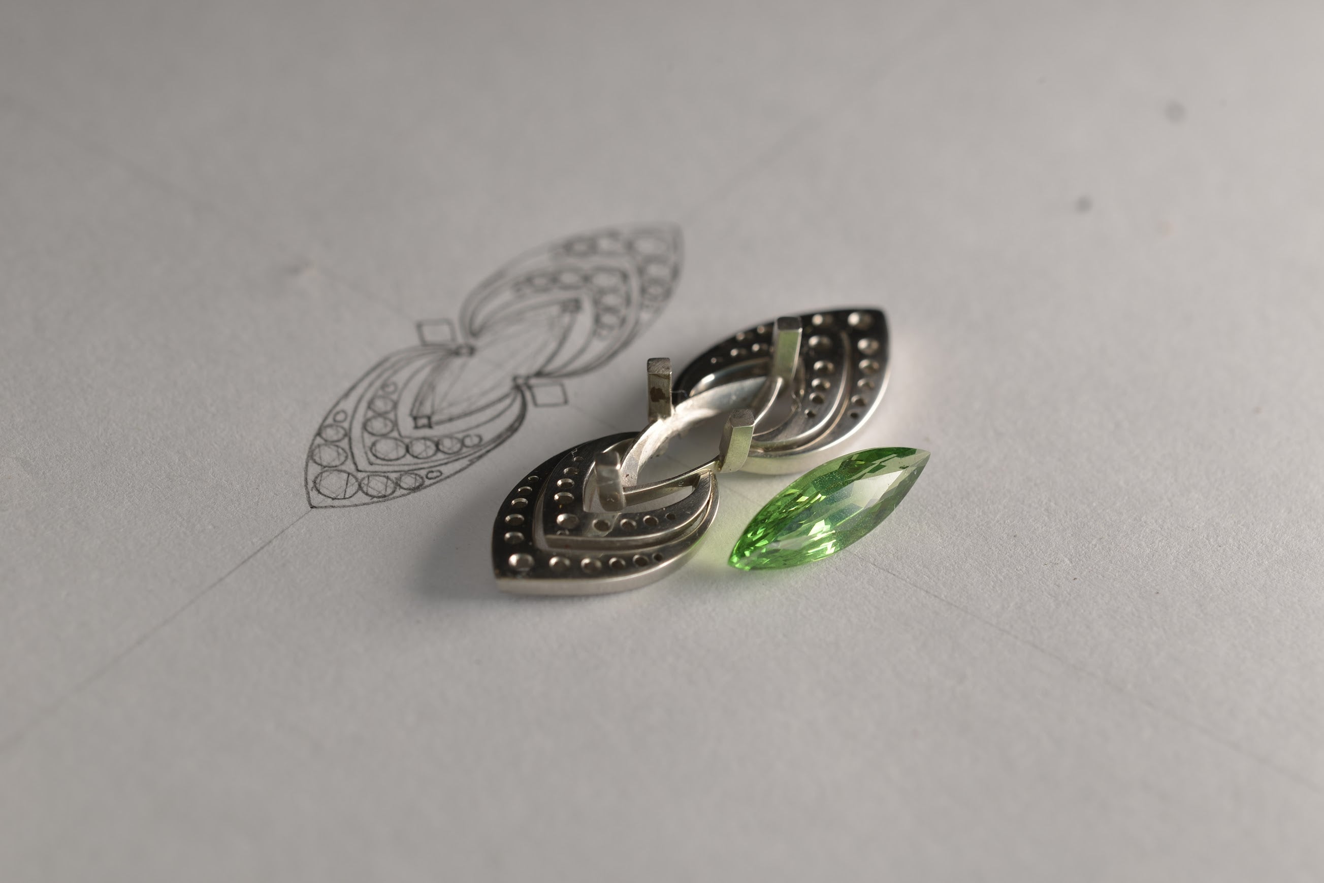 Making of bespoke platinum and rose gold ring with a 2.25ct marquise tsavorite garnet. Handmade by Sydney jeweller Nicky Burles.