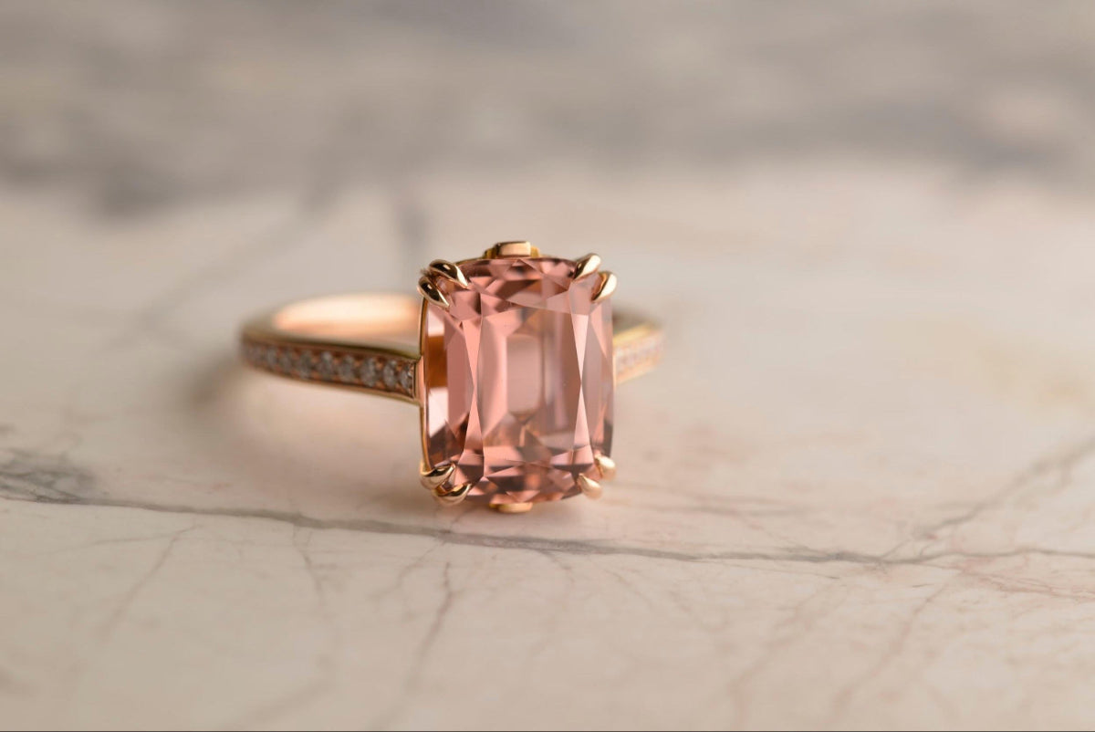 Art deco inspired bespoke rose gold ring featuring a 5.56ct pink antique cushion cut Afghan tourmaline set in double claws and with 36 diamonds set on the band. Handmade by Sydney jeweller Nicky Burles.