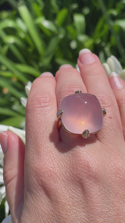 Wearing 50 carat rose quartz ring set in 18-carat gold with pave-set claws adorned in natural diamonds. Handmade by Sydney jeweller Nicky Burles.