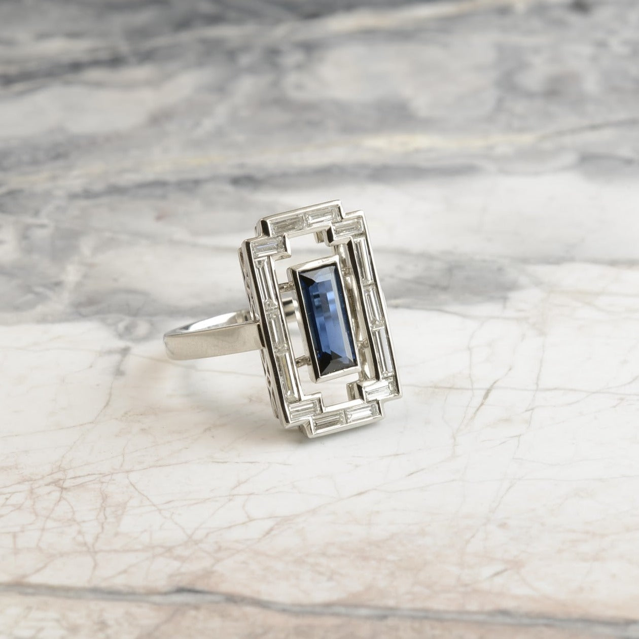 Art Deco sapphire and double row diamond ring made in platinum